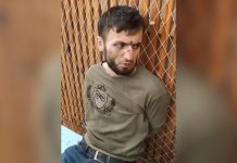 OVO JE VOĐA TERORISTA KOJI SU POČINILI MASAKR U MOSKVI: Novi snimak saslušanja, vezane mu ruke i noge, uopšte ne zna ruski (VIDEO)